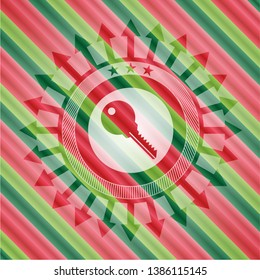key icon inside christmas emblem background.
