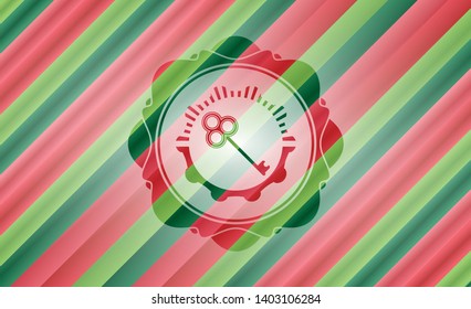 key icon inside christmas style emblem.