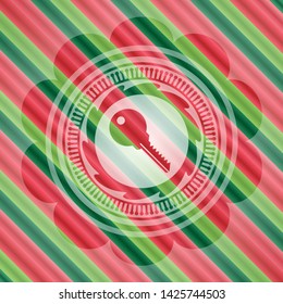 key icon inside christmas style badge..