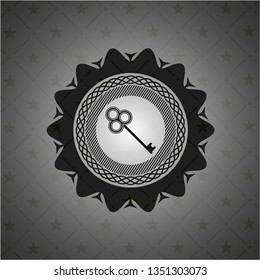 key icon inside dark emblem. Retro