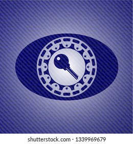 key icon inside denim background