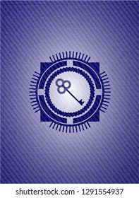 key icon inside emblem with jean texture