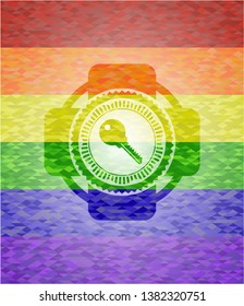 key icon inside emblem on mosaic background with the colors of the LGBT flag