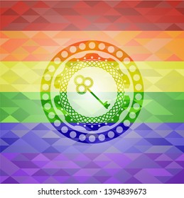 key icon inside emblem on mosaic background with the colors of the LGBT flag