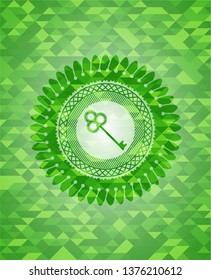 key icon inside green emblem with mosaic ecological style background