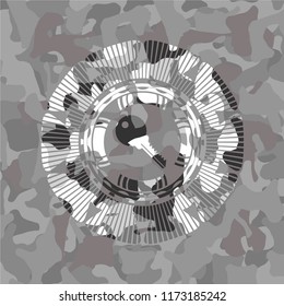 key icon inside grey camo texture