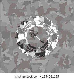 key icon inside grey camo texture