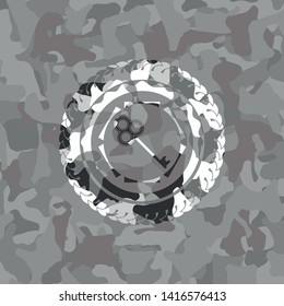 key icon inside grey camo texture