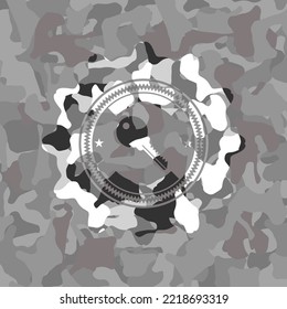 key icon inside grey camo texture. 