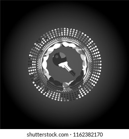 key icon inside grey camouflage emblem