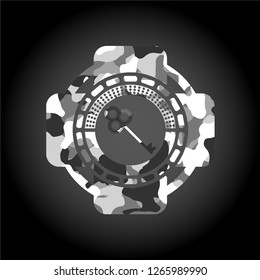 key icon inside grey camouflage texture