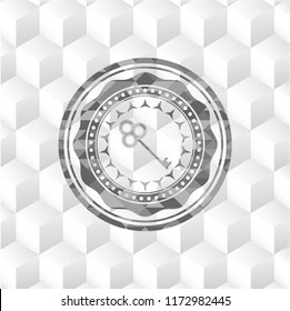 key icon inside grey emblem with cube white background