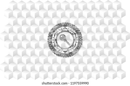 key icon inside grey emblem with geometric cube white background