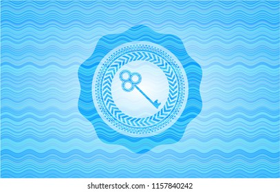 key icon inside light blue water emblem background.