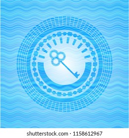key icon inside light blue water emblem.
