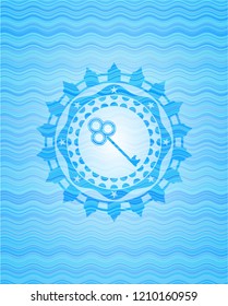 key icon inside light blue water emblem.