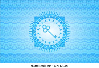 key icon inside light blue water badge.