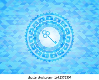 key icon inside light blue mosaic emblem
