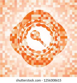 key icon inside orange mosaic emblem