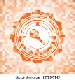key icon inside orange mosaic emblem with background