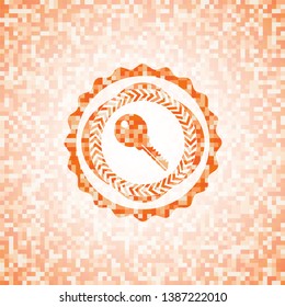 key icon inside orange mosaic emblem with background