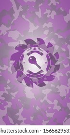 key icon inside pink and purple camouflage emblem