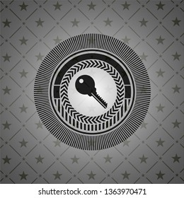 key icon inside realistic black emblem