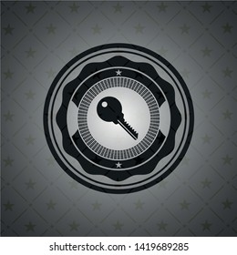 key icon inside realistic black emblem