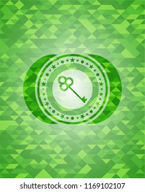 key icon inside realistic green mosaic emblem