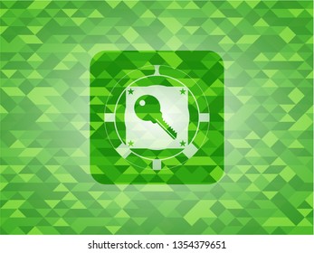 key icon inside realistic green mosaic emblem