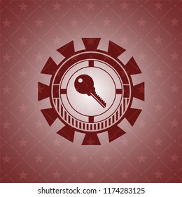 key icon inside realistic red emblem