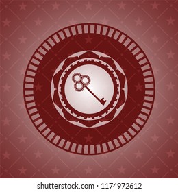 key icon inside realistic red emblem