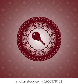 key icon inside realistic red emblem