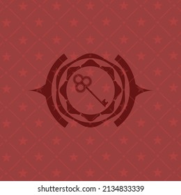 key icon inside red emblem. 
