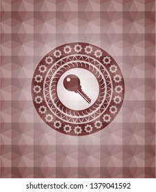 key icon inside red seamless polygonal badge.