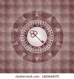 key icon inside red seamless emblem or badge with abstract geometric polygonal pattern background.