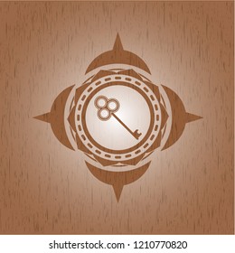 key icon inside retro style wooden emblem