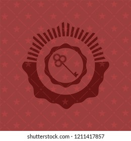 key icon inside retro style red emblem