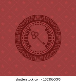 key icon inside retro style red emblem