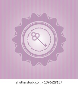 key icon inside retro style pink emblem