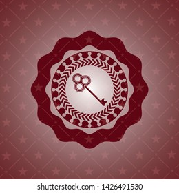 key icon inside retro style red emblem