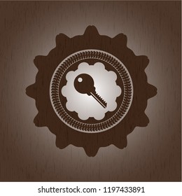 key icon inside retro wood emblem