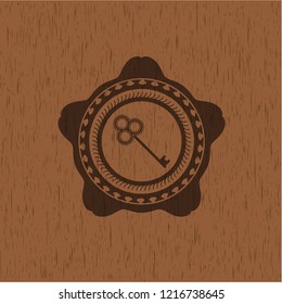 key icon inside retro wood emblem