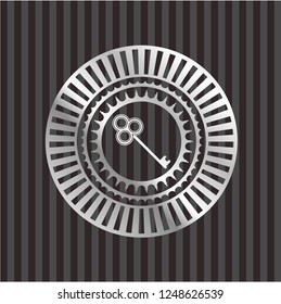key icon inside silver shiny emblem