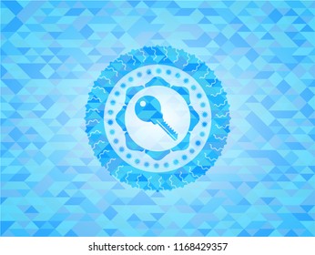 key icon inside sky blue mosaic emblem