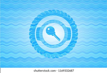 key icon inside sky blue water style badge.