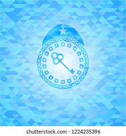 key icon inside sky blue emblem with mosaic background