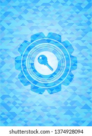 key icon inside sky blue emblem with mosaic background