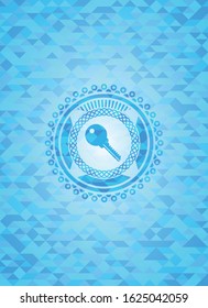 key icon inside sky blue mosaic emblem