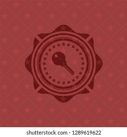 key icon inside vintage red emblem